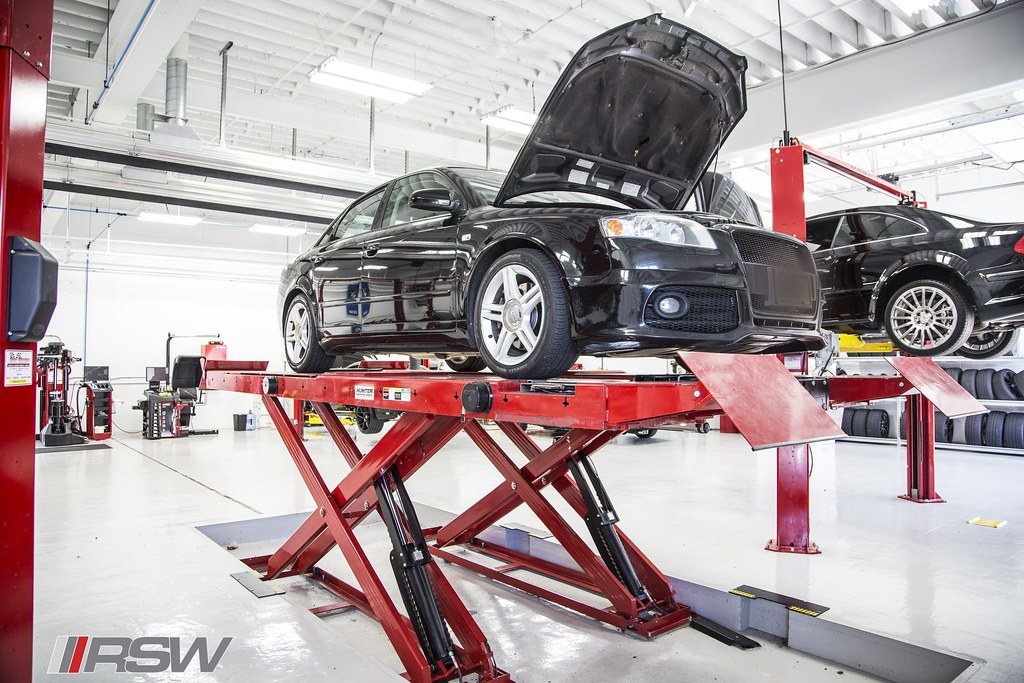 A car raised with the hood open for inspection at RSW Auto Repair in Kinnelon, NJ