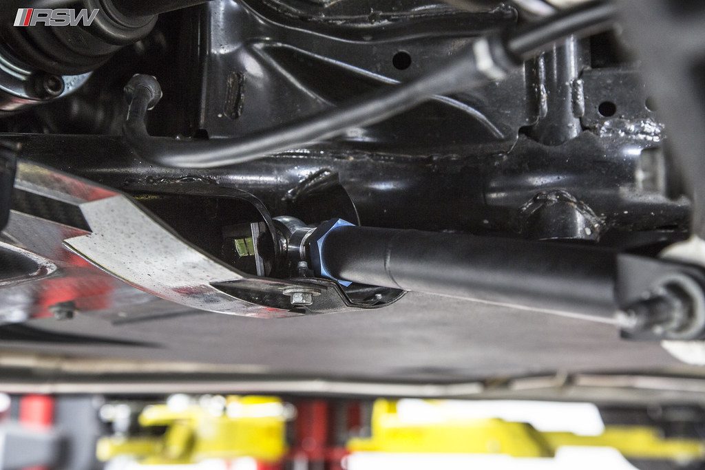 A vehicle raised on the lift for engine and cooling access at RSW Auto Repair in Kinnelon, NJ