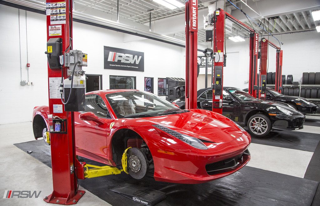 A Ferrari 458 raised on the lift with a wheel off for brake work at RSW in Kinnelon, NJ