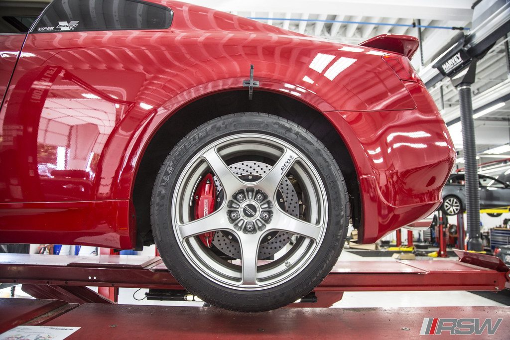 Infiniti G35 wheel and suspension during an alignment at RSW Auto Repair