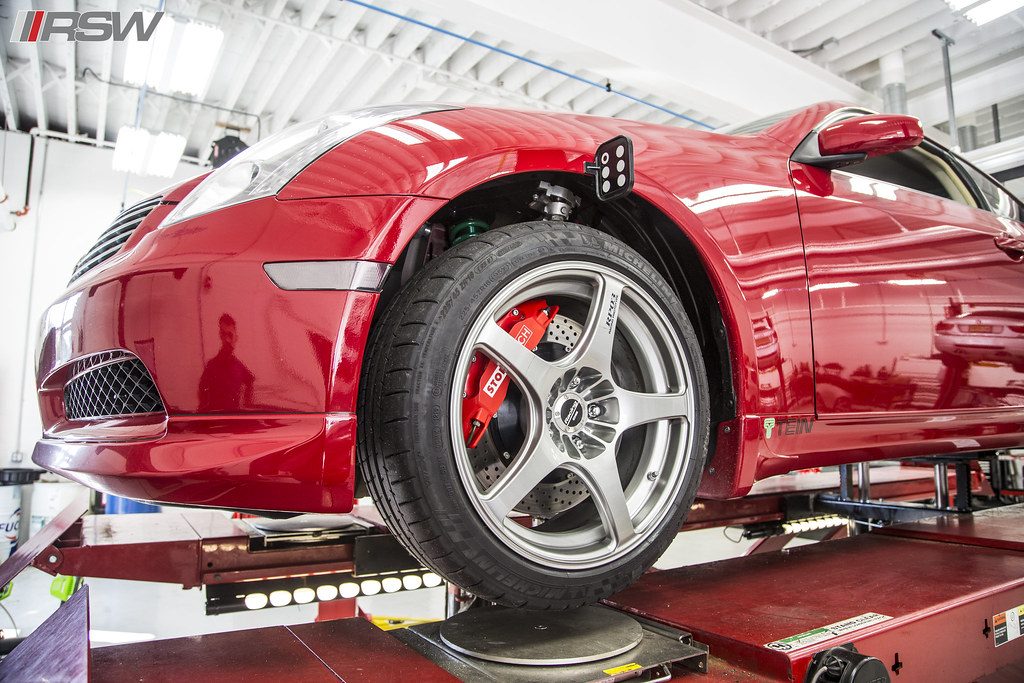 An Infiniti G35 on the alignment rack at RSW Auto Repair in Kinnelon, NJ