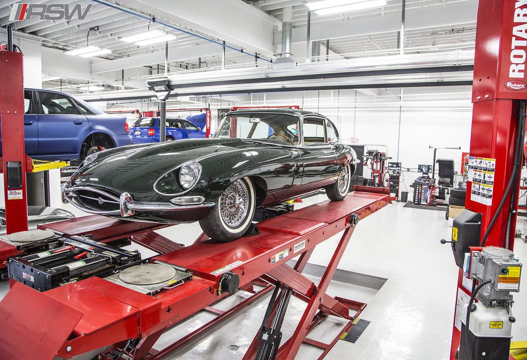 Front end of a Jaguar E-Type in the service bay at RSW Auto Repair