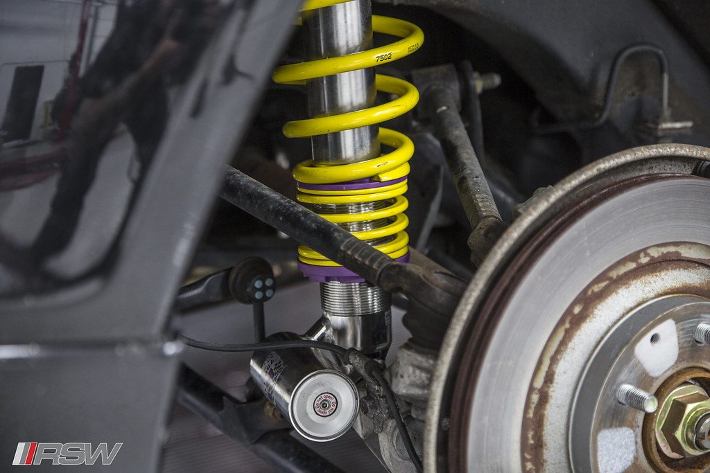 Coilover, brake rotor and hub detail during suspension work at RSW Auto Repair in Kinnelon, NJ