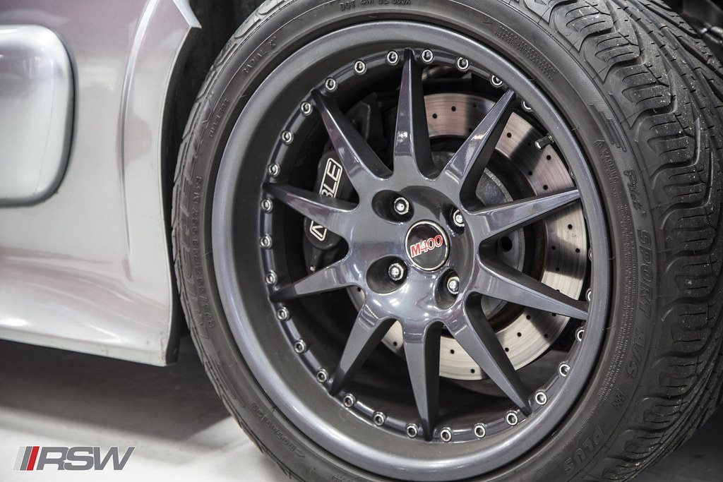 A wheel, tire and brake rotor in close up at RSW Auto Repair in Kinnelon, NJ
